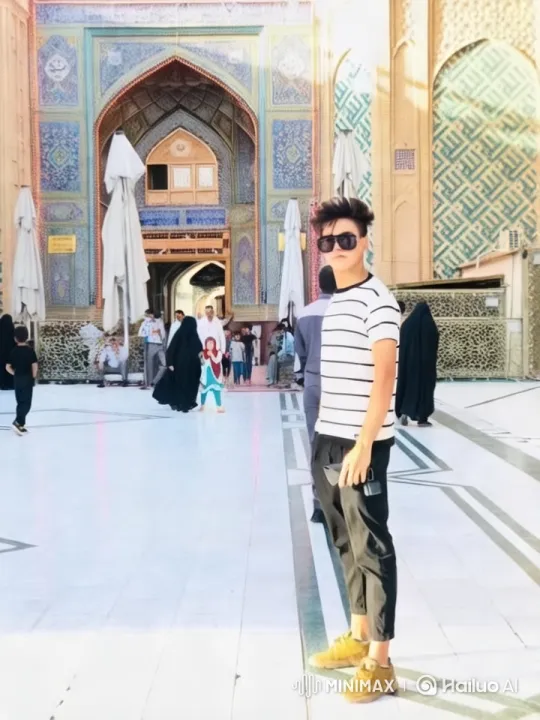 Vibrant Courtyard Scene with Ornate Building and Bustling Activity – AI Generated Video | Hailuo AI