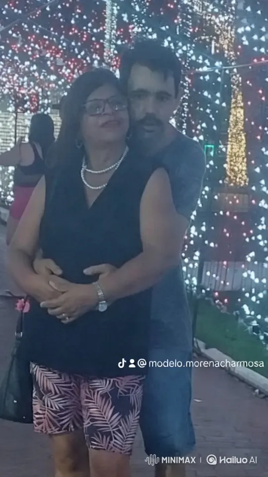 Couple Embraced Under Festive Holiday Lights – AI Generated Video | Hailuo AI