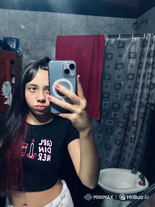 Young Woman Dancing in Bathroom with Aesthetic Vibes – AI Generated Video | Hailuo AI