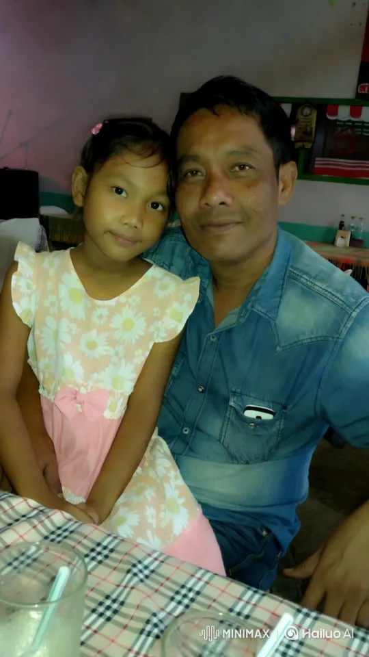 Young Girl and Man Enjoy Drinks in Cozy Setting – AI Generated Video | Hailuo AI
