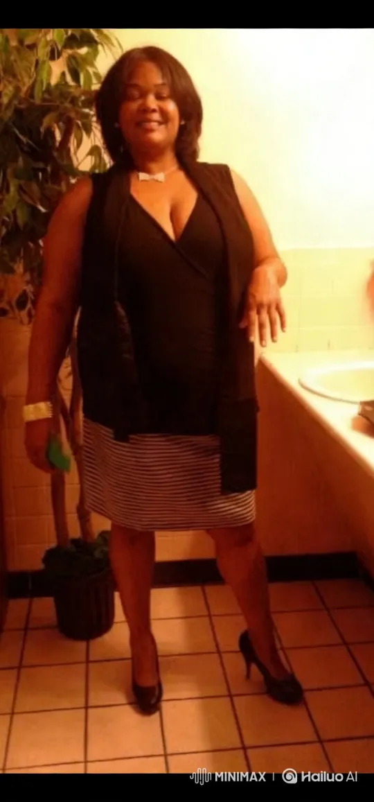 Confident Woman in Stylish Outfit in Bathroom Setting – AI Generated Video | Hailuo AI