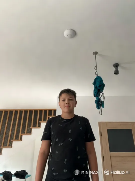 Boy Running Through Modern Minimalist Room – AI Generated Video | Hailuo AI
