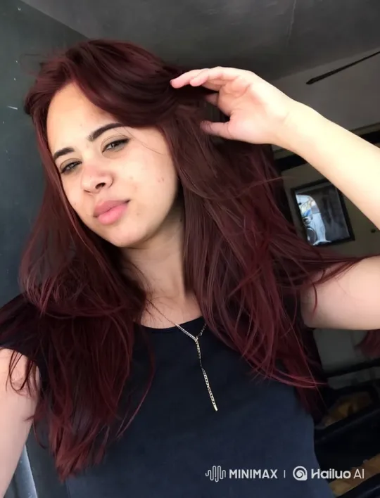 Elegant Dance of a Red-haired Woman in Minimalist Setting – AI Generated Video | Hailuo AI