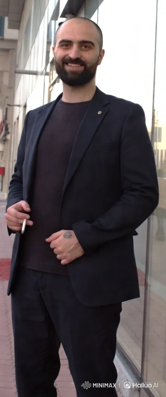 Urban Sophistication: Man with Tattoo in Modern Setting – AI Generated Video | Hailuo AI