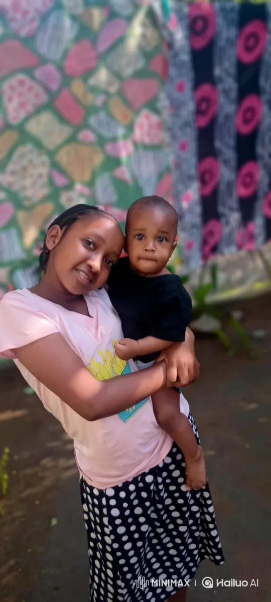 Woman and Baby Share Tender Moment in Colorful Setting – AI Generated Video | Hailuo AI