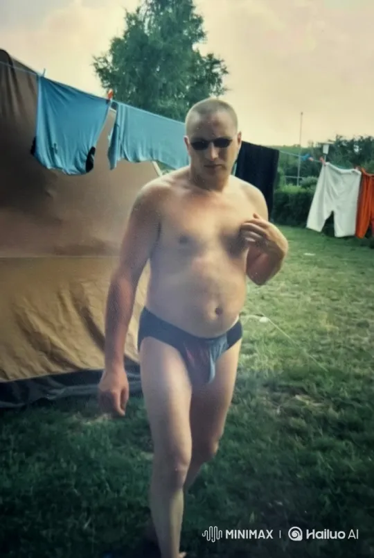 Energetic Man in Serene Campsite Setting – AI Generated Video | Hailuo AI