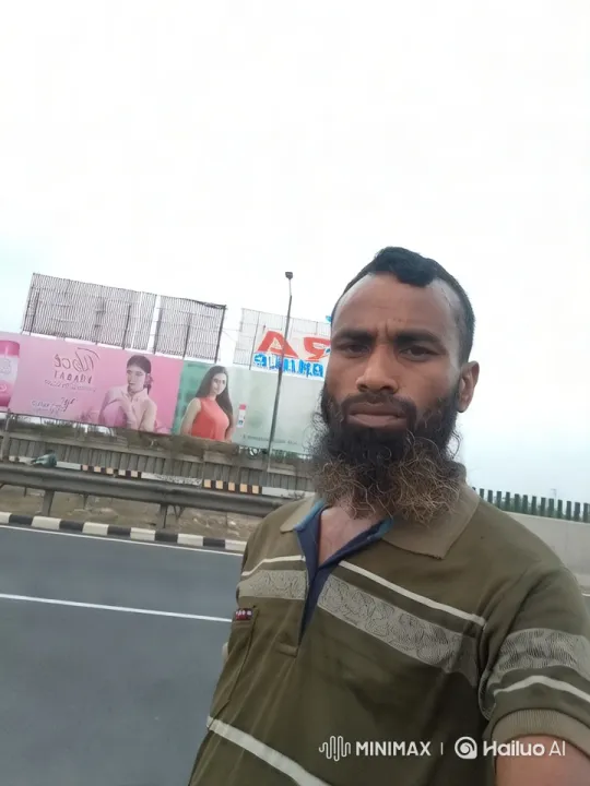 Man by Roadside with Dynamic Camera Movement – AI Generated Video | Hailuo AI