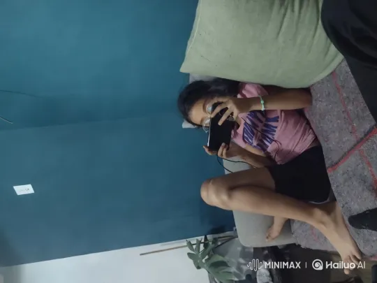 Child Playing Game on Couch in Minimalist Room – AI Generated Video | Hailuo AI