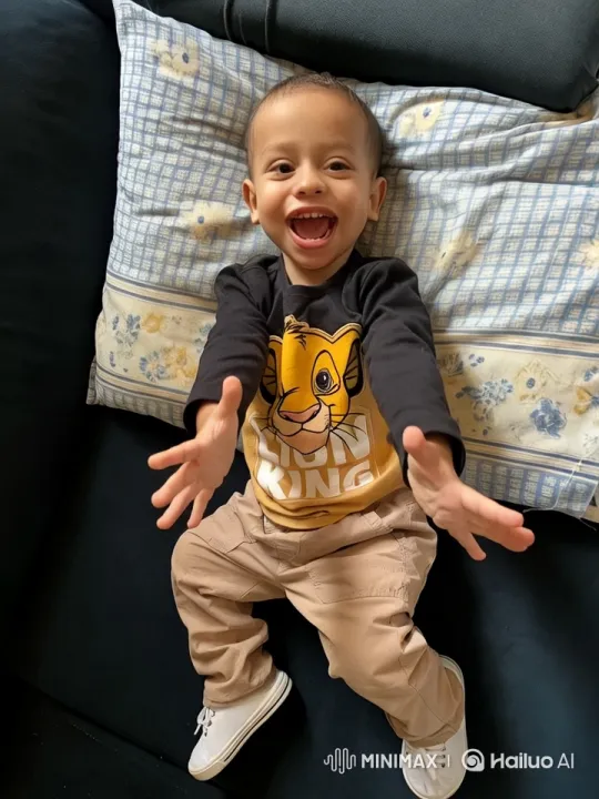 Energetic Child Plays Joyfully in Cozy Bedroom – AI Generated Video | Hailuo AI