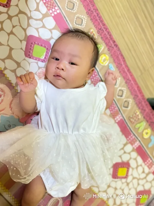 Baby Dances and Mimics Kung Fu on Colorful Mat – AI Generated Video | Hailuo AI
