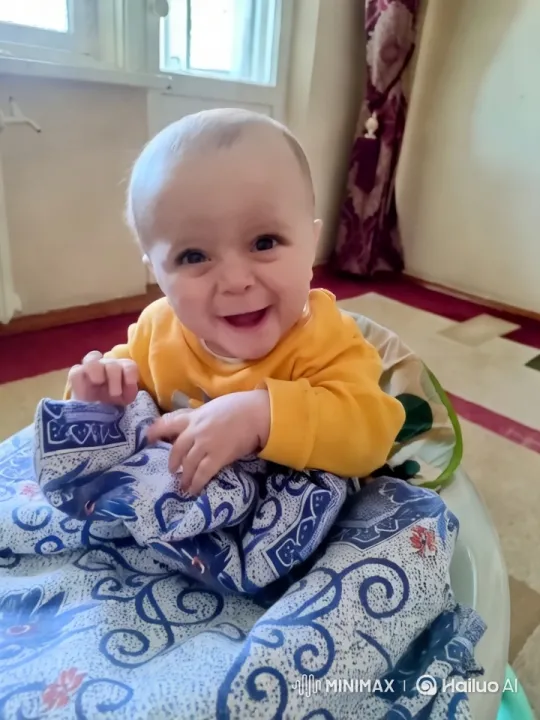 Baby on Blanket: A Serene, Close-Up Study – AI Generated Video | Hailuo AI