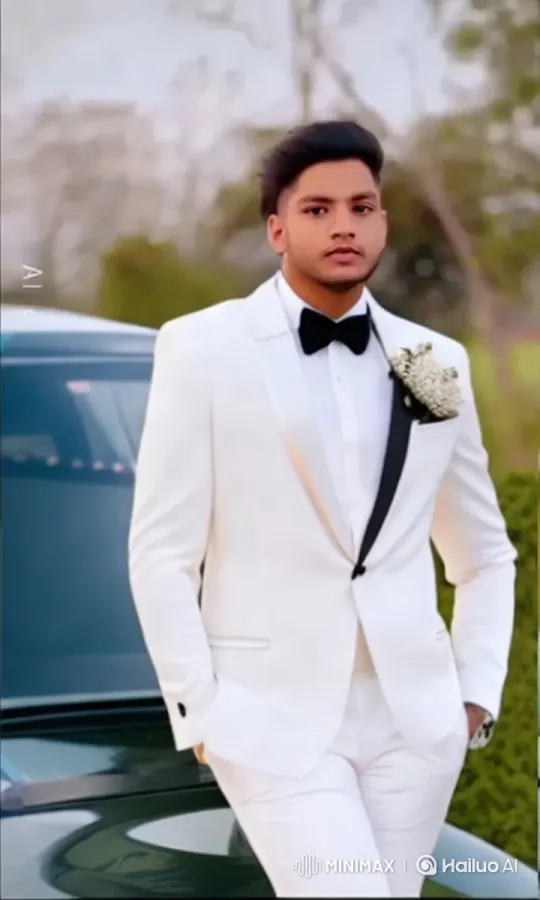 Elegant Man in White Tuxedo Showcases Sophistication – AI Generated Video | Hailuo AI