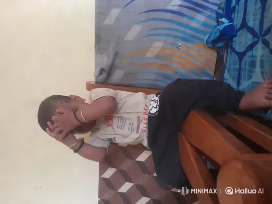 Young Boy in Minimalistic Indoor Setting with Magical Outdoor Background – AI Generated Video | Hailuo AI