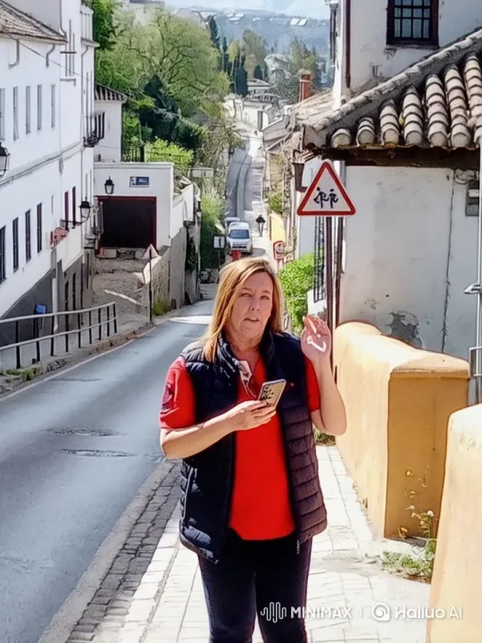 Woman Explains Town's Charm with Smartphone in Hand – AI Generated Video | Hailuo AI