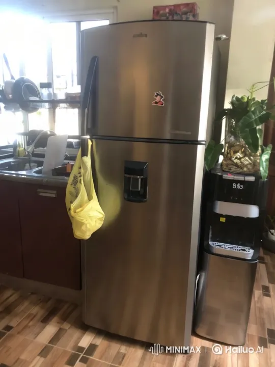 Freezer Sticks Itself to Ceiling in Modern Kitchen – AI Generated Video | Hailuo AI