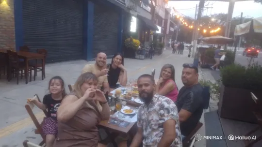 Festive Gathering in Lively Outdoor Restaurant Setting – AI Generated Video | Hailuo AI
