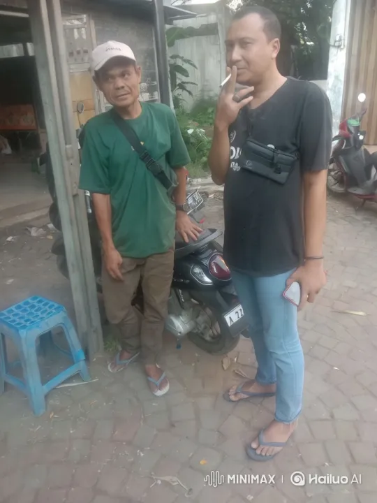 Scuffle Erupts Between Two Men Near Motorcycle – AI Generated Video | Hailuo AI