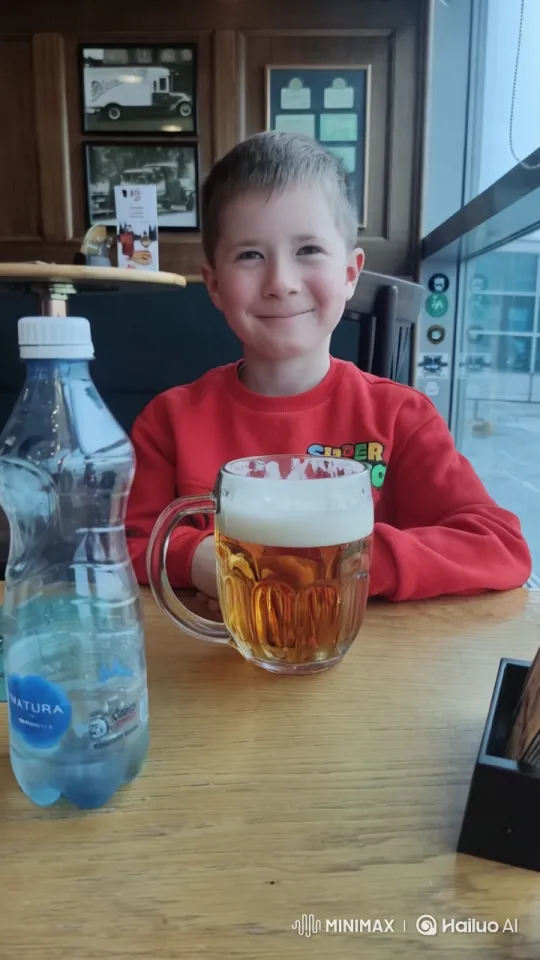 Young Boy Enjoying Beer in Cozy Pub Setting – AI Generated Video | Hailuo AI