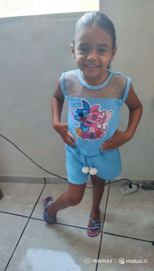 Confident Girl Showcases Outfit in Bright Room – AI Generated Video | Hailuo AI