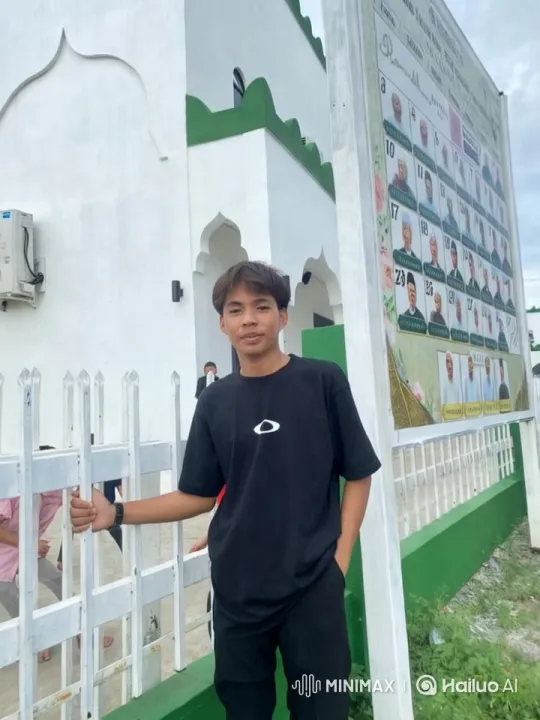 Young Man at Elegant Building with Cinematic Camera Movements – AI Generated Video | Hailuo AI