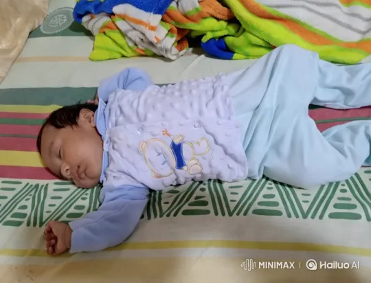 Baby's Joyful Dance in Cozy Bed Setting – AI Generated Video | Hailuo AI