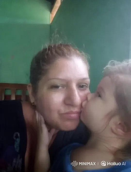 Intimate Mother-Child Moment in Cozy Green Room – AI Generated Video | Hailuo AI