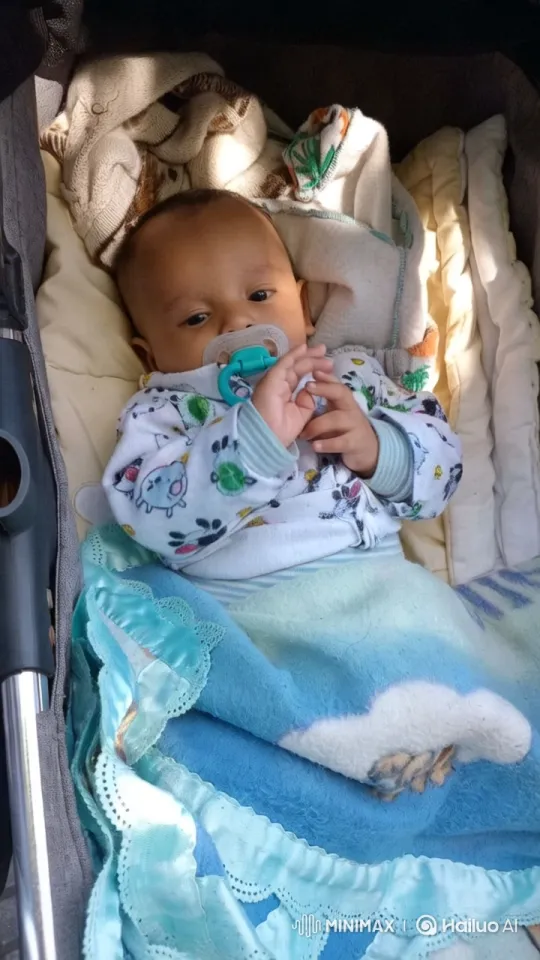 Baby's Joyful Dance in Cozy Stroller Setting – AI Generated Video | Hailuo AI