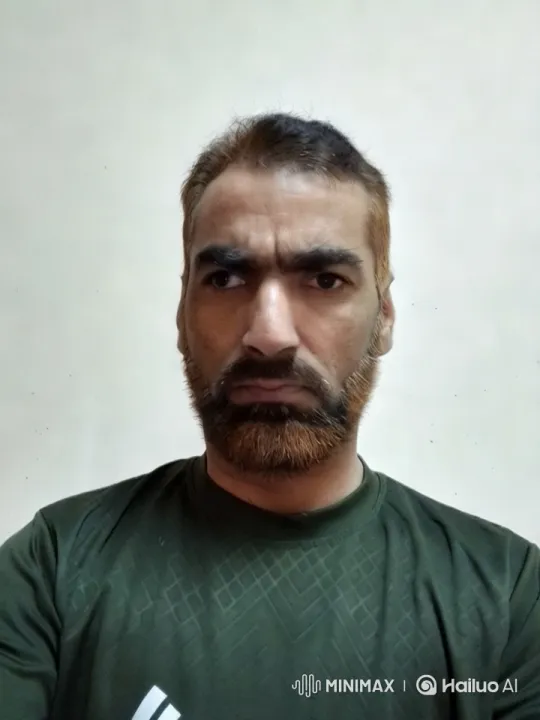 Close-up of a Person in a Patterned Shirt – AI Generated Video | Hailuo AI