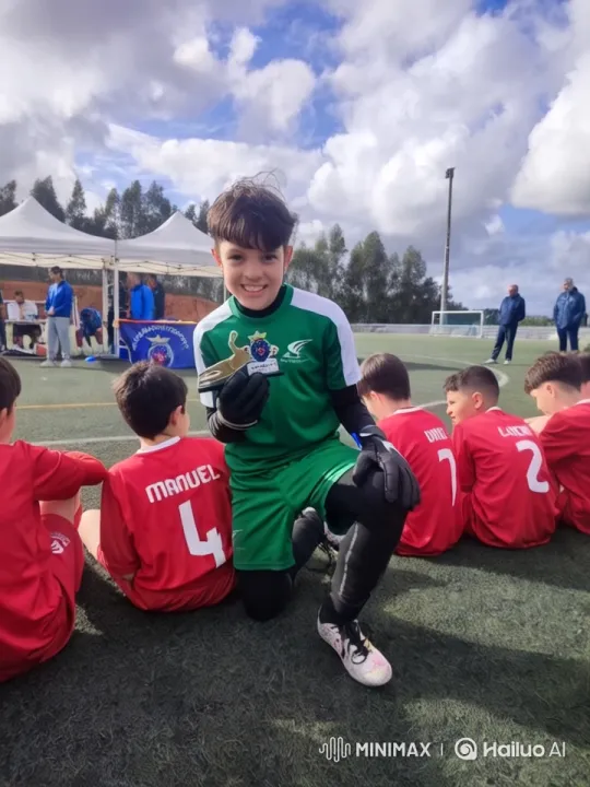 Young Goalkeeper Celebrates with Trophy at Sports Event – AI Generated Video | Hailuo AI
