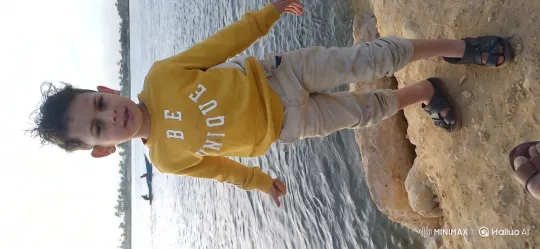 Child's Playful Dance by Calm River with Boaters – AI Generated Video | Hailuo AI