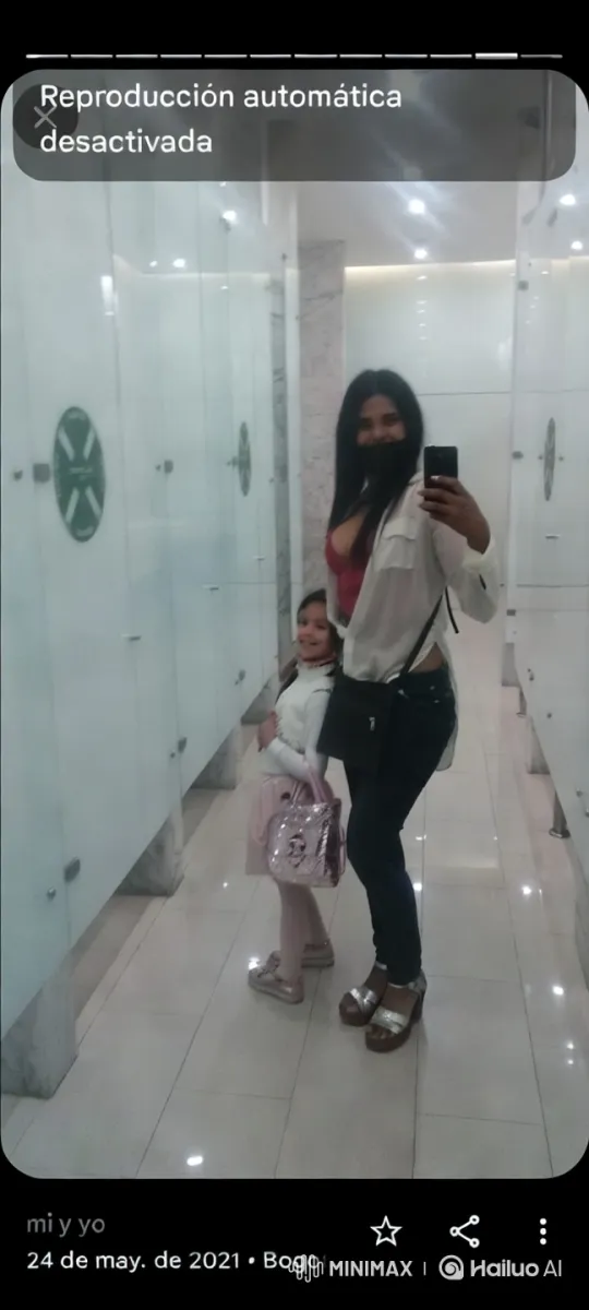 Modern Restroom Mirror Selfie with Fashionable Duo – AI Generated Video | Hailuo AI