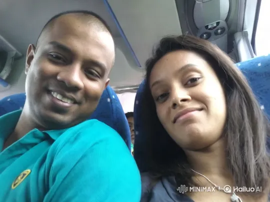 Intimate Moment Between Couple on a Blue-Upholstered Bus – AI Generated Video | Hailuo AI