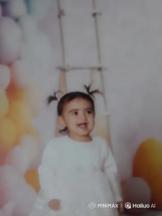 Joyful Child Celebrates with Balloons in Colorful Scene – AI Generated Video | Hailuo AI