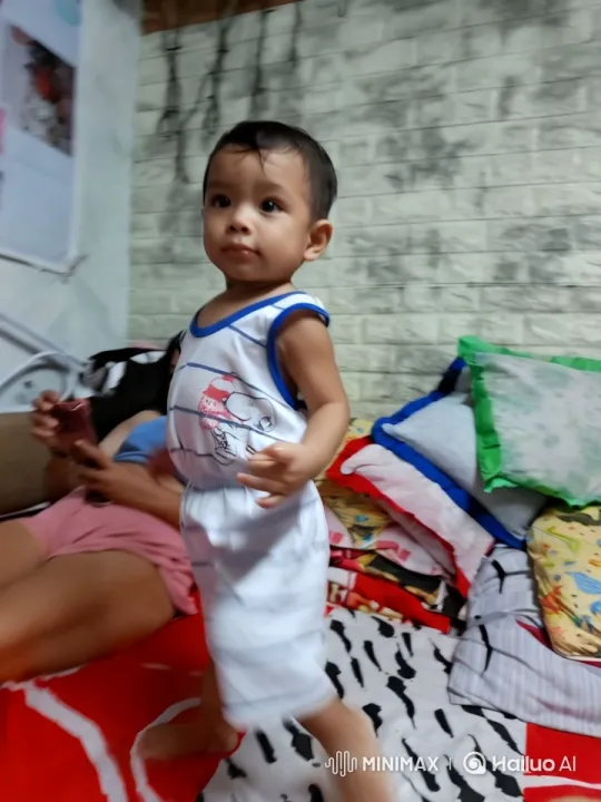 Child's Energetic Dance and Kung Fu Moves on Bed – AI Generated Video | Hailuo AI
