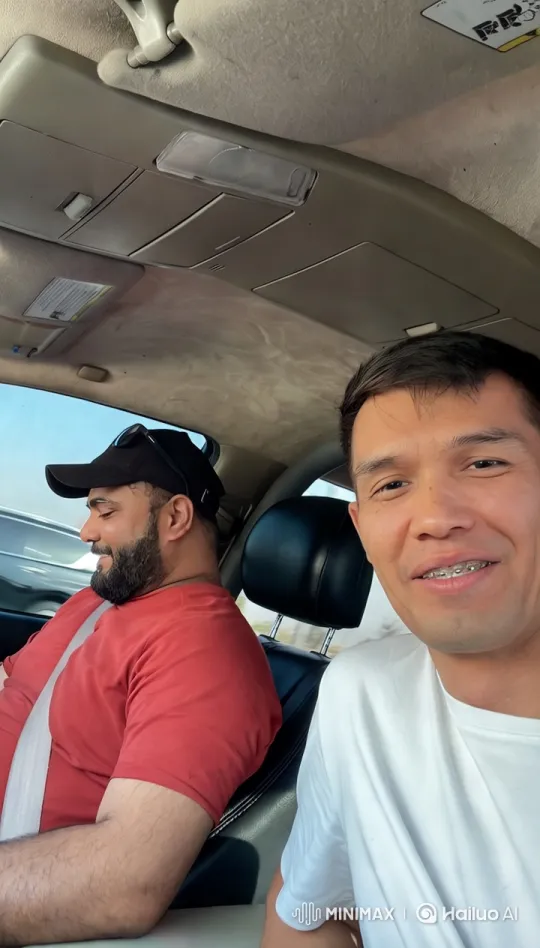 Two Men Hold 'Namaste' in Car Interior – AI Generated Video | Hailuo AI