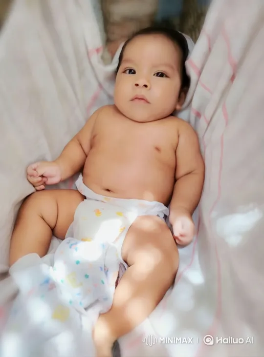 Baby's Joyful Dance in Gentle Hammock Sunlight – AI Generated Video | Hailuo AI