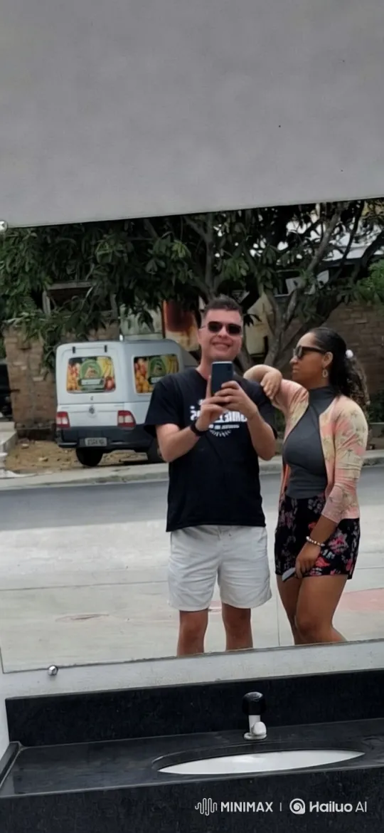 Couple's Tender Moment Captured in Mirror Reflection – AI Generated Video | Hailuo AI