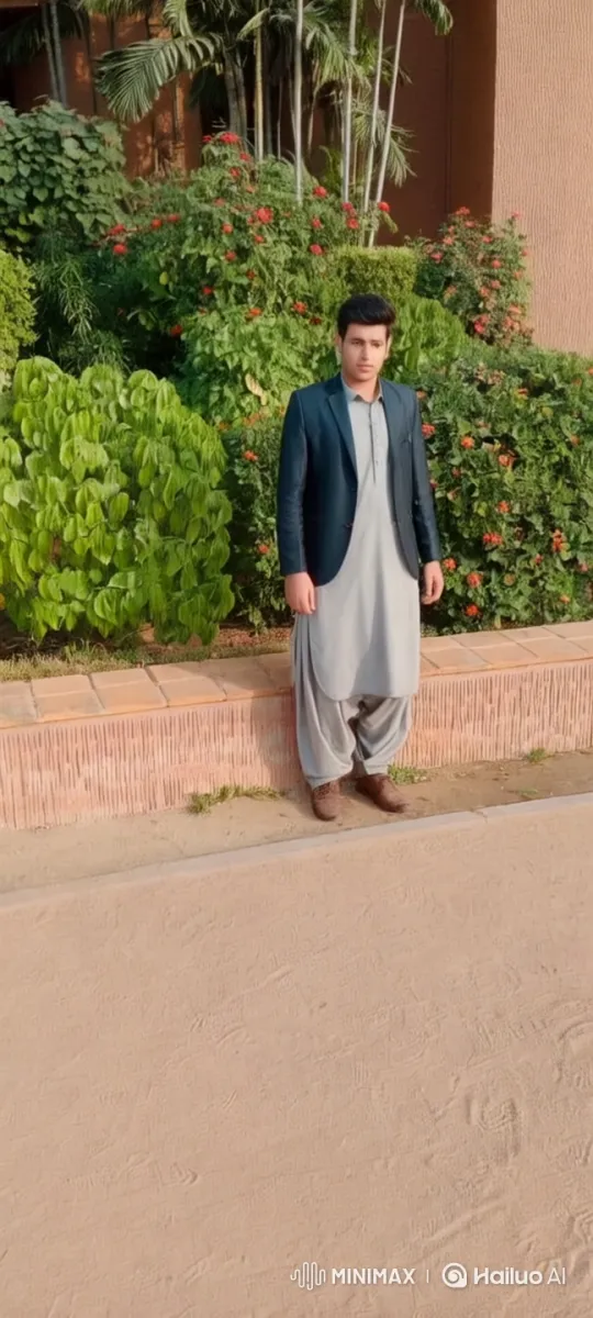 Young Man Advocates for Perfect Short Film Scripts in Garden Setting – AI Generated Video | Hailuo AI