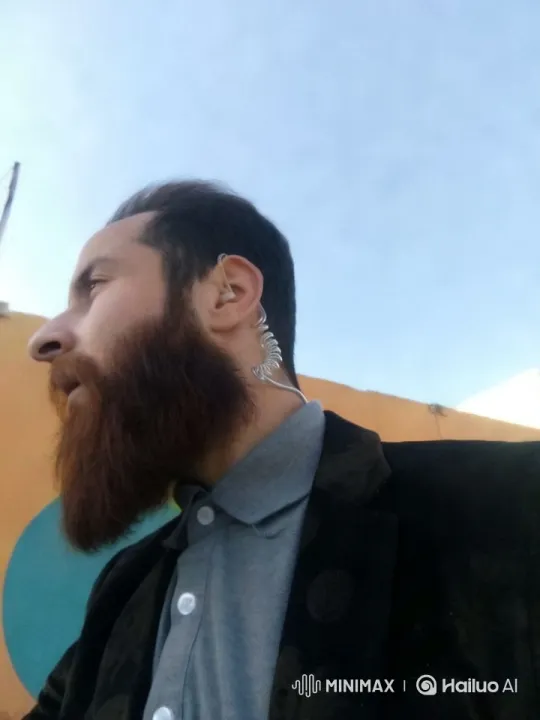 Sophisticated Man Showcased with Hollywood Aesthetic – AI Generated Video | Hailuo AI