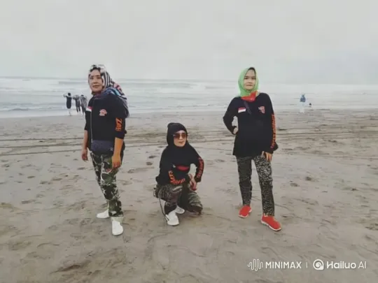 Coordinated Dance on Sandy Beach with Ocean Waves – AI Generated Video | Hailuo AI