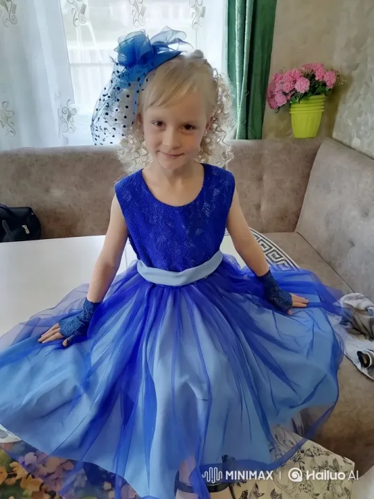Young Girl in Blue Dress Dancing Gracefully – AI Generated Video | Hailuo AI