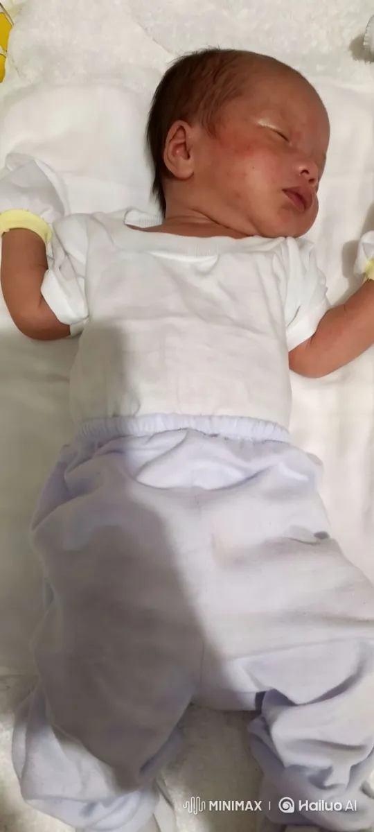 Newborn's Gentle Movements Captured in Serene Video – AI Generated Video | Hailuo AI