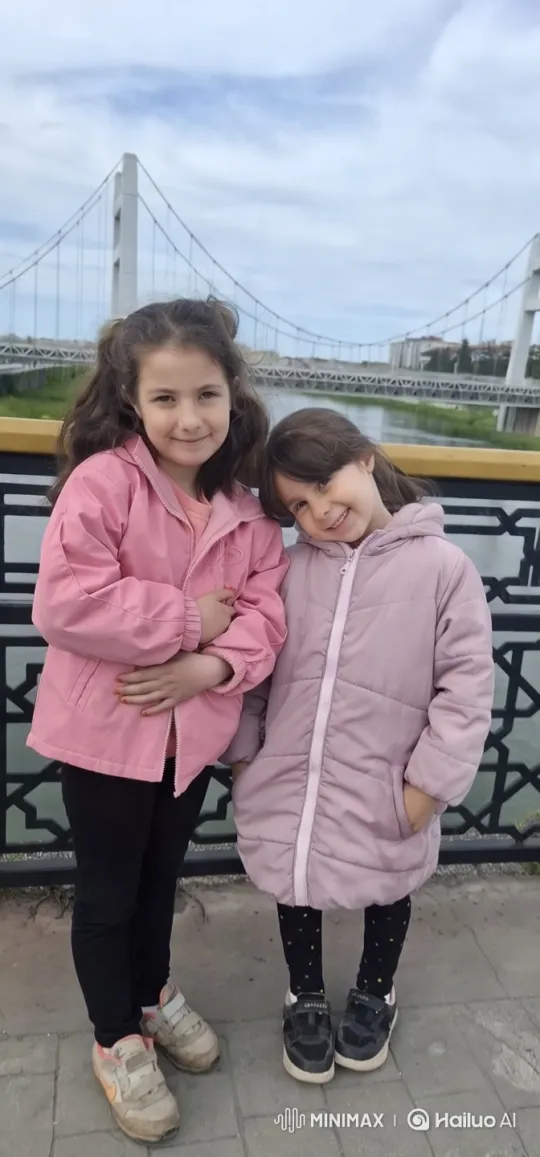 Girls Embrace on Scenic Suspension Bridge – AI Generated Video | Hailuo AI