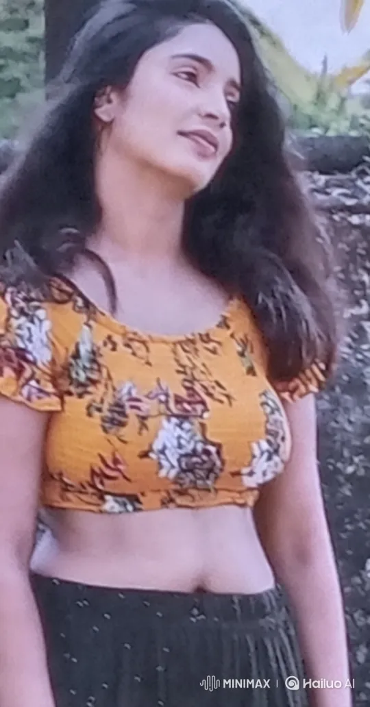 Woman in Yellow Crop Top in Lush Green Setting – AI Generated Video | Hailuo AI