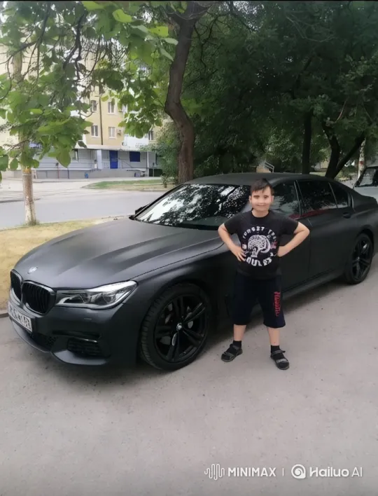 Boy Drives BMW Away on Quiet Street – AI Generated Video | Hailuo AI