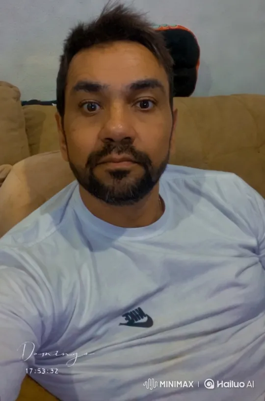 Man Mimics Superman Flight in Stylish Living Room Video – AI Generated Video | Hailuo AI