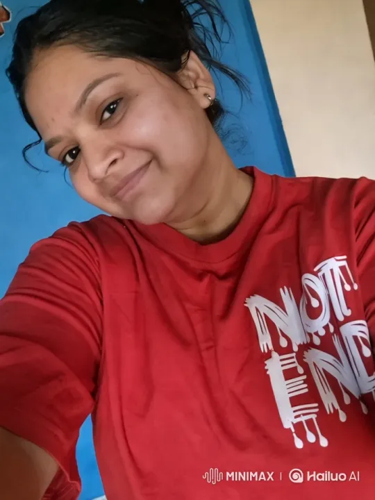 Vibrant Red Shirt Against Blue Wall – AI Generated Video | Hailuo AI