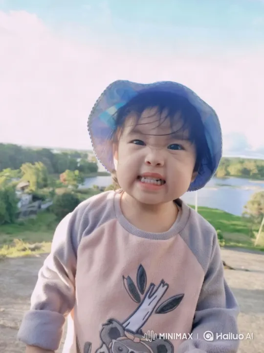 Child in Nature: Serene Landscape and Gentle Motion – AI Generated Video | Hailuo AI