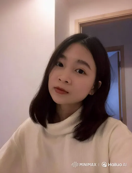Contemplative Woman in Warm Indoor Setting – AI Generated Video | Hailuo AI