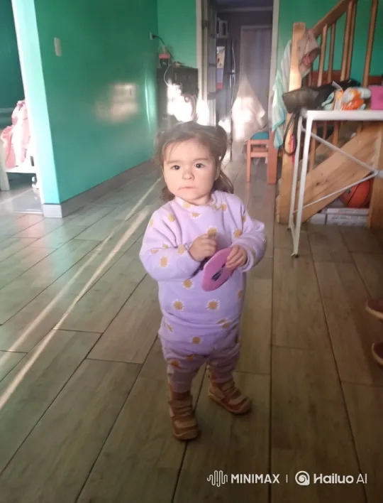 Child Dancing Joyfully in Cozy, Bright Room – AI Generated Video | Hailuo AI